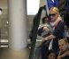 Pour la première fois, Charlize Theron présente son fils Jackson, à l'aéroport de Paris Roissy, le 8 mai 2012