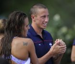 Laure Manaudou et Fred Bousquet, ici en photo en juin 2011 à l'Open EDF, reviennent en France en juin 2012 pour s'installer définitivement à Marseille.