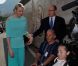 Le prince Albert et Charlene dans une tenue très particulière le 26 mai 2012 dans le paddock auprès de personnes handicapées à l'occasion du Grand Prix de Monaco