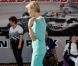 Le prince Albert et Charlene le 26 mai 2012 dans le paddock à la rencontre de personnes hadicapées à l'occasion du Grand Prix de Monaco