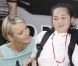 Le prince Albert et Charlene sont allés rencontrées des personnes handicapées dans le paddock du Grand Prix de Monaco le 26 mai 2012