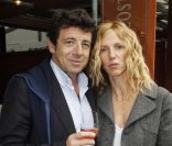 Patrick Bruel et Sandrine Kiberlain avant la finale de Roland-Garros entre Rafael Nadal et Novak Djokovic le 10 juin 2012 à Paris