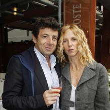 Patrick Bruel et Sandrine Kiberlain avant la finale de Roland-Garros entre Rafael Nadal et Novak Djokovic le 10 juin 2012 à Paris