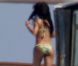 En vacances en Sardaigne, Rihanna exhibe ses jolies courbes dans un bikini aux motifs floraux. Porto Cervo, le 16 juillet 2012.