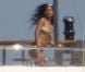 Rihanna profite du soleil de Sardaigne sur un yacht. Porto Cervo, le 16 juillet 2012.