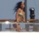 Rihanna profite du soleil de Sardaigne sur un yacht. Porto Cervo, le 16 juillet 2012.