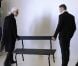 Baptiste Giabiconi pose dans le lookbook de la collection automne-hiver 2012-2013 shooté par Karl Lagerfeld