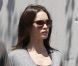 Megan Fox, enceinte, dévoile son petit ventre rond aux côtés de son époux Brian Austin Green à West Hollywood le 25 juillet 2012