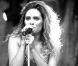  Clara Morgane, sublime, lors du concert "ON THE BEACH" à Liège durant lequel elle s'est produite aux côtés du DJ Jey Didarko, son mari, et de ses danseurs Harmony et Fabso le 2 août 2012. 