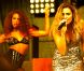  Clara Morgane lors du concert "ON THE BEACH" à Liège durant lequel elle s'est produite aux côtés du DJ Jey Didarko, son mari, et de ses danseurs Harmony et Fabso le 2 août 2012. 