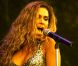  Clara Morgane, sublime, lors du concert "ON THE BEACH" à Liège durant lequel elle s'est produite aux côtés du DJ Jey Didarko, son mari, et de ses danseurs Harmony et Fabso le 2 août 2012. 