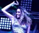  Clara Morgane, superbe et déchaînée, lors du concert "ON THE BEACH" à Liège durant lequel elle s'est produite aux côtés du DJ Jey Didarko, son mari, et de ses danseurs Harmony et Fabso le 2 août 2012. 