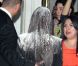Kim Kardashian agressée avec de la farine par des activistes de la PeTA, à Los Angeles, le 22 mars 2012.
