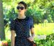 Emmy Rossum, dans un parc de Los Angeles, joue la photographe devant les paparazzi. Le 15 août 2012