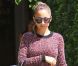  Nicole Richie à Los Angeles, habillée d'un sweater Alexandra Wang, d'un sac Givenchy, d'un jean noir et de chaussures 'Mikola' de House of Harlow 1960. Le 4 septembre 2012. 