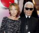 Laura Smet auprès de Karl Lagerfeld qui présente sa collection spéciale pour la marque de cosmétiques Shu Uemura, à Paris, le 11 septembre 2012.