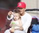 David Beckham : Harper sur les genoux et ses fils sur le terrain, il savoure
