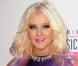 Christina Aguilera met ses formes en valeur lors de l'annonce des nominations des American Music Awards au JW Marriott. Los Angeles, le 9 octobre 2012.