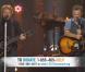 Bon Jovi et Bruce Springsteen lors du grand concert de soutien aux victimes de l'ouragan Sandy, le 12 décembre 2012 à New York.