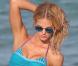 Exclusif - Erin Heatherton, revenue de St-Barth, exécute son numéro de charme pour Victoria's Secret sur une plage à Miami. Le 19 décembre 2012.