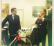Nicolas Sarkozy reçoit un vélo de l'ancien cycliste Mario Cipollini pour son 58e anniversaire, le 28 janvier 2012 à Paris