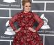 Adele aux Grammys : Chahutée mais félicitée par Chris Brown
