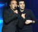 Nikos Aliagas et Mustapha El Atrassi sur la scène de Bobino pour la grande soirée humoristique "Europe 1 fait Bobino", le 18 février 2013