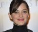 Marion Cotillard : Sublime et chic, elle fait cavalier seul pour Guillaume Canet