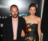 Maggie Gyllenhaal et son fiancé Peter Sarsgaard à la Première mondiale de Batman The Dark Knight