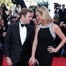 Laurence Ferrari et son mari Renaud Capuçon, complices, à la montée des marches du film Le Passé, lors du 66e Festival du film de Cannes, le 17 mai 2013.