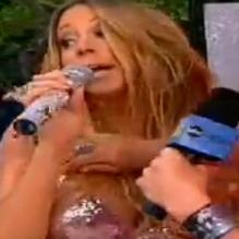 Mariah Carey a craqué bien involontairement sa robe lors de de son concert donné pour l'émission Good Morning America en direct, à New York, le 24 mai 2013.