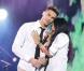 Baptiste Giabiconi et Anggun lors du concert M6 Music Live à Issy-les-Moulineaux le 15 juin 2013