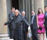 Le père Guy Gilbert, le prince Philippe de Bourbon et son épouse
