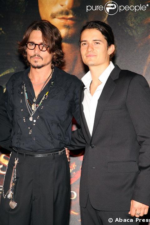 Johnny Depp avec Orlando Bloom pour l'avant Premiere des Pirates des Caraibes 3 a Paris
