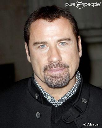 John Travolta à son arrivée à l'hôtel