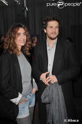 Guillaume Canet et Mlle Agnès au défilé Louis Vuitton hier à Paris