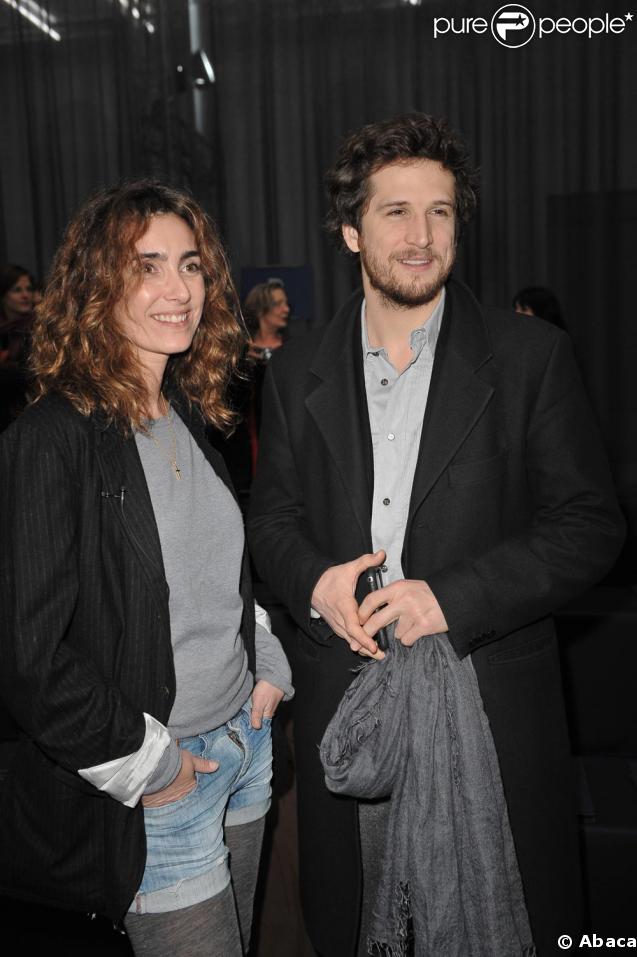 Guillaume Canet et Mlle Agnès au défilé Louis Vuitton hier à Paris