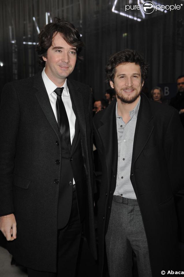 Guillaume Canet et Antoine Arnault au défilé Louis Vuitton hier à Paris