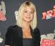 Virginie Efira porte une robe bustier qui souligne sa taille de guêpe. Bravo pour la courte veste à manches ballon ! 01/10/07 