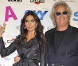 Flavio Briatore et sa femme Elisabetta Gregoraci, à Milan lors de la Fashion Week ce week-end.  