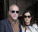 Amira Casar porte aussi une belle fourrure mais ceintrée. Avec le comédien Pascal Greggory l'accompagne tout en élégance à ce défilé parisien de Balenciaga le 5 mars 2009