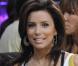 Eva Longoria lors d'un match de NBA... Elle porte un sac jaune Darel très tendance !