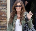 Ashley Tisdale se prépare pour la promo de son album. Un bon look et le sourire !
