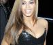 Beyoncé choisit un décolleté généreux et une robe courte... pour la première de son film Obsessed !