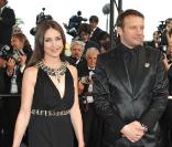 Elsa Zylberstein au côté de l'acteur Samuel Le Bihan lors de la montée des marches pour l'ouverture du 62e Festival de Cannes le 13 mai 2009
