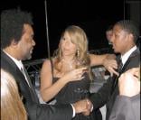 Mariah Carey et son mari Nick Cannon, à la Villa Murano, le 15 mai 2009. Elle lui présente Lee Daniels, le réalisateur de Precious... 