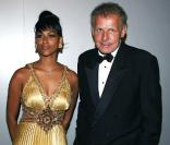 PPDA et une amie à l'occasion de la soirée Figaro Madame au Pavillon Canal+, le 20 mai 2009 lors du 62e Festival de Cannes