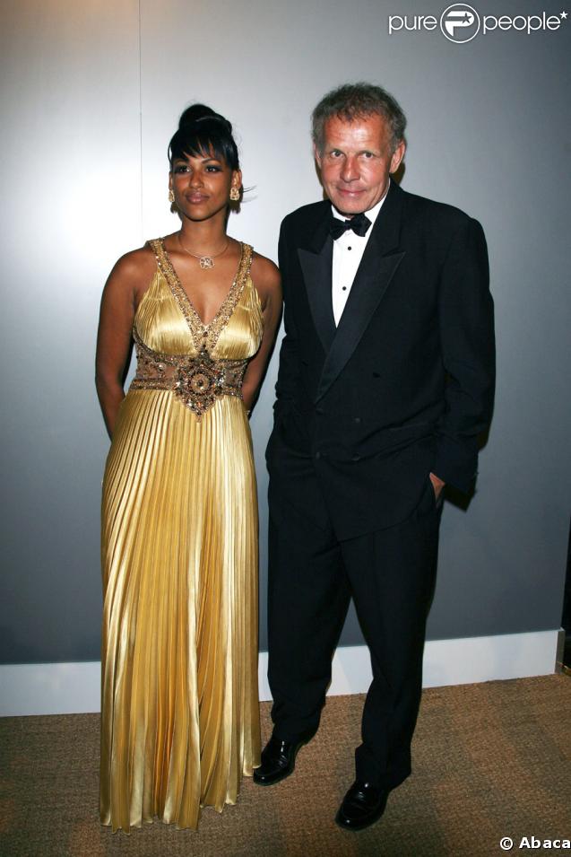 PPDA et une amie à l'occasion de la soirée Figaro Madame au Pavillon Canal+, le 20 mai 2009 lors du 62e Festival de Cannes