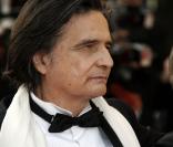 Jean-Pierre Léaud lors de la montée des marches précédant la projection de Visage le 23 mai 2009 durant le 62e Festival de Cannes