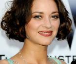 Marion Cotillard, superbe avec des bijoux Chopard, lors de la soirée de l'amfAR, en mai 2009 !